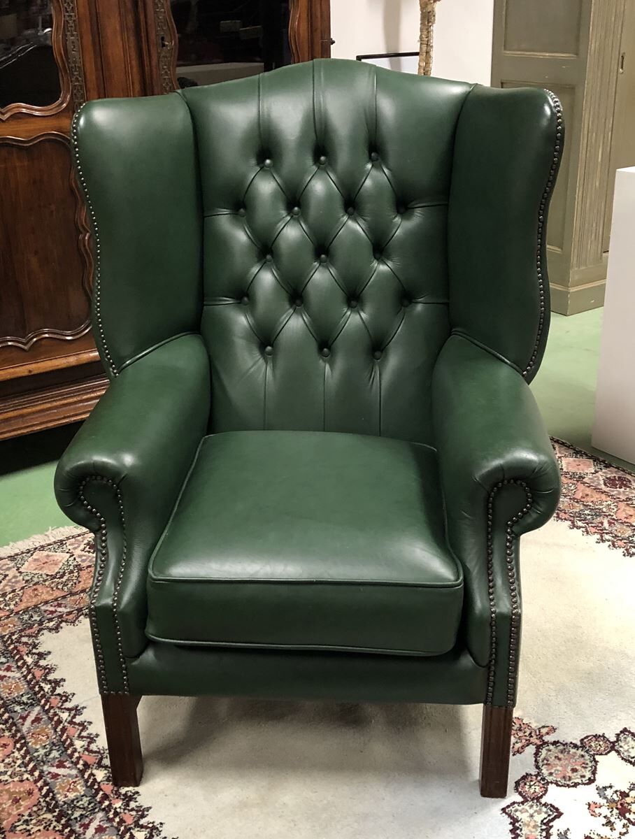 In the 1970s green leather Chesterfield armchair