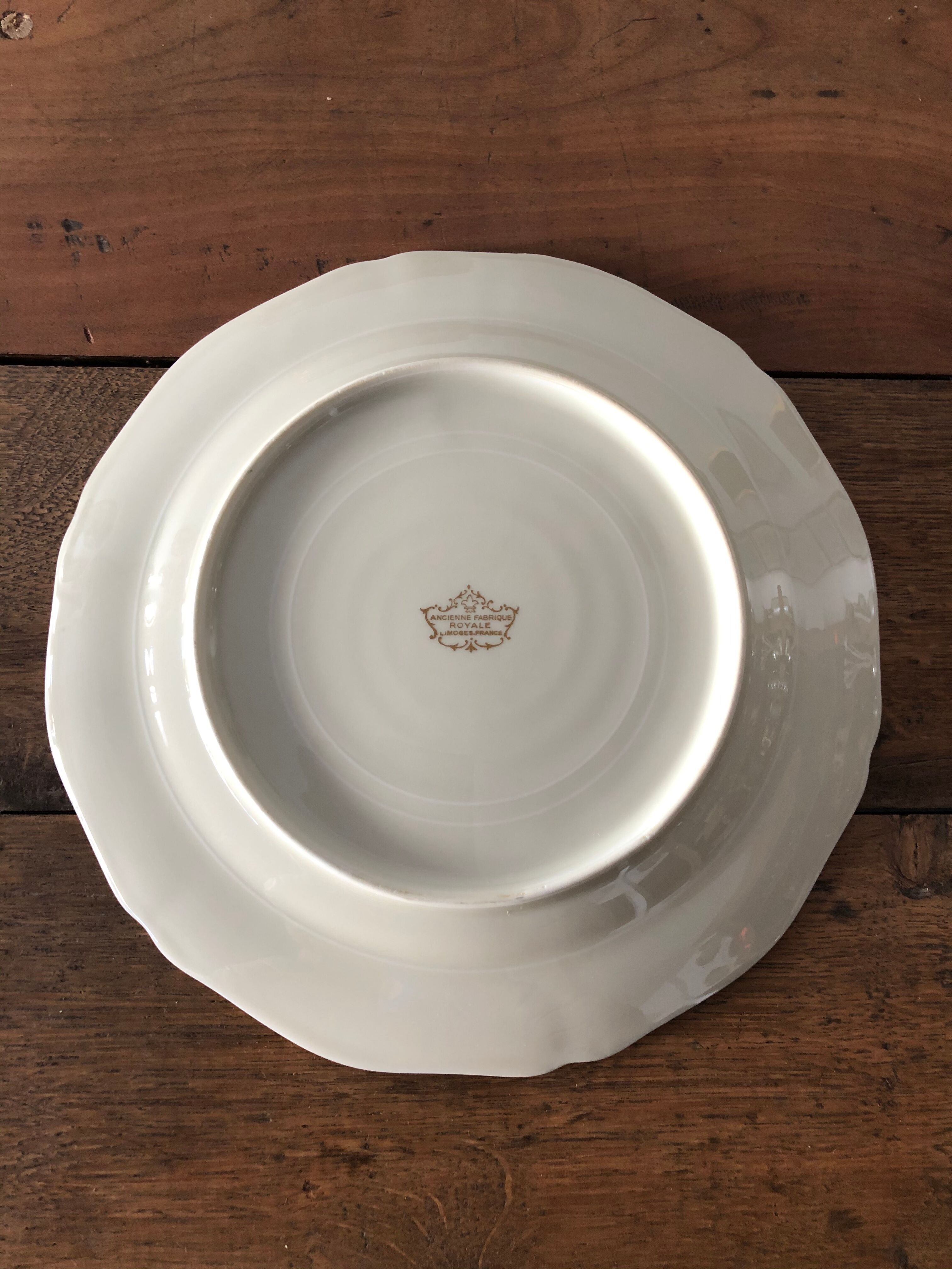Service of 8 flat plates, Limoges