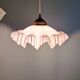 Art Deco trio of suspensions in coloured frilled opaline, 1920-30.