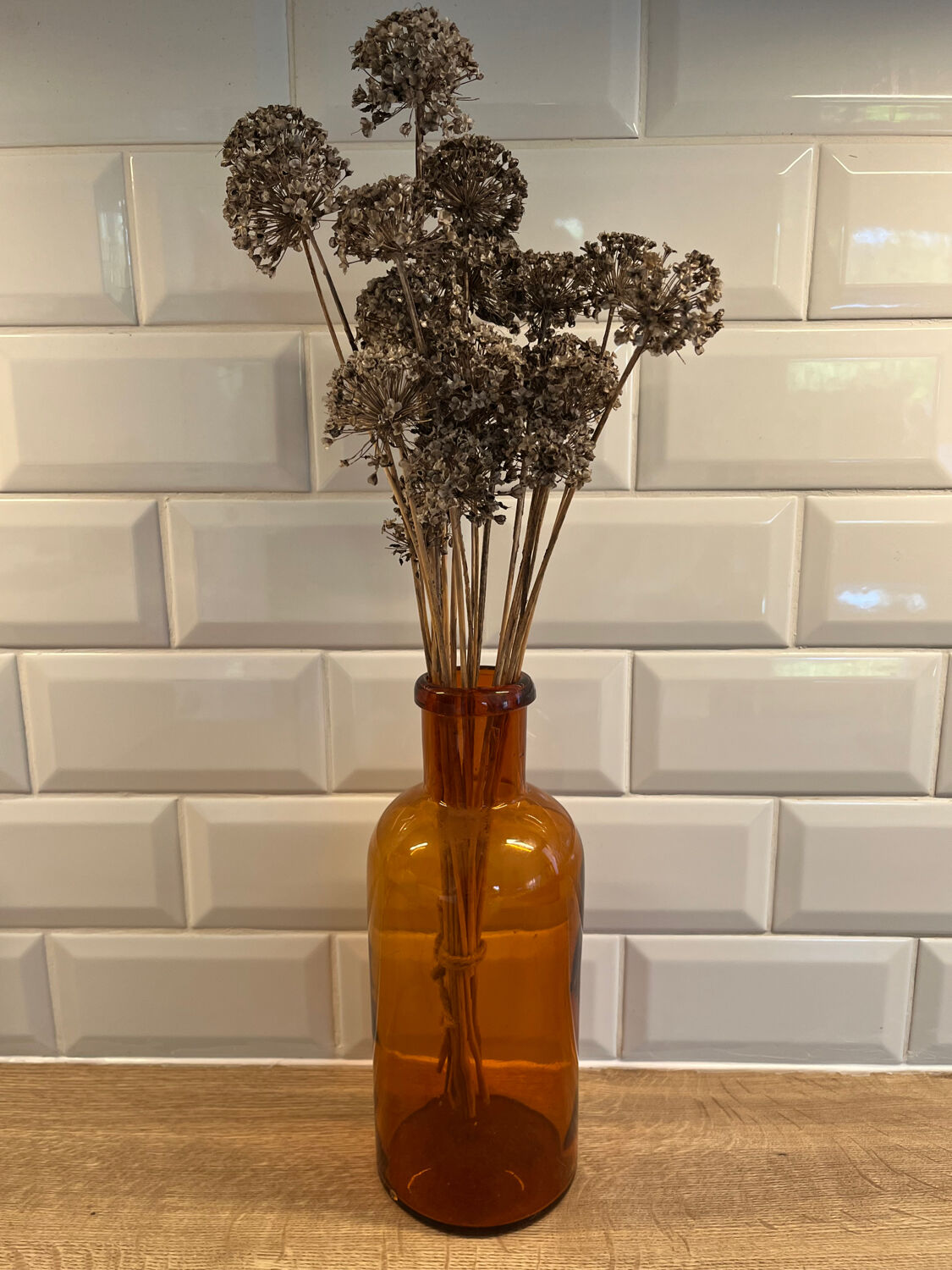 Amber glass bottle vase