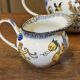 Tea and coffee service in Gien earthenware from the late 19th century with Renaissance decoration.
