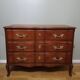 Commode arbalète trois tiroirs en merisier