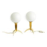 Two Mid-Century Modern rocket table lamps in brass and glass