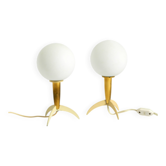 Two Mid-Century Modern rocket table lamps in brass and glass