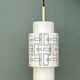 Vintage suspension globe in white opaline with black drawings.