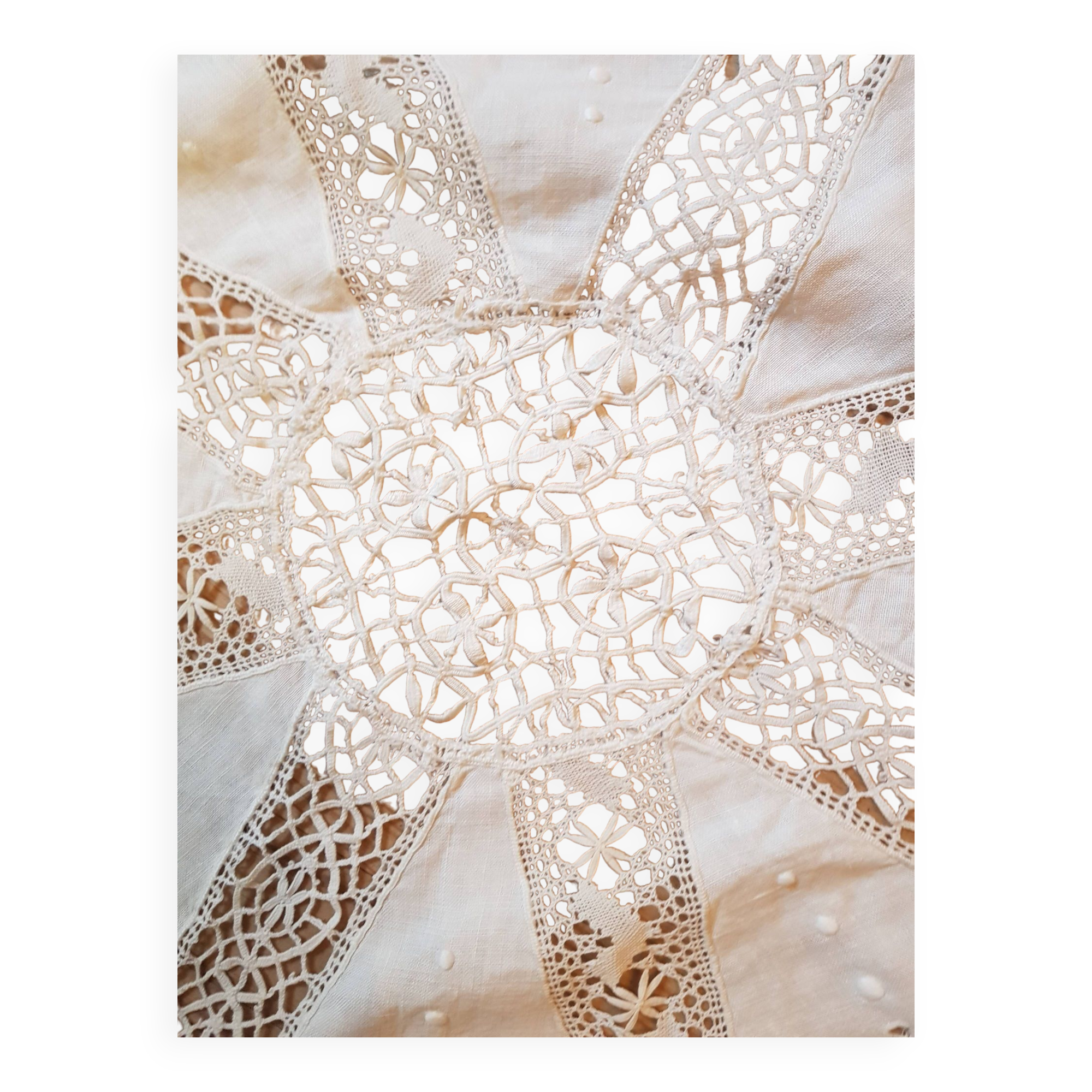 Round hand-embroidered linen tablecloth