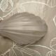 Art Deco wall light in frosted pink glass shell design.
