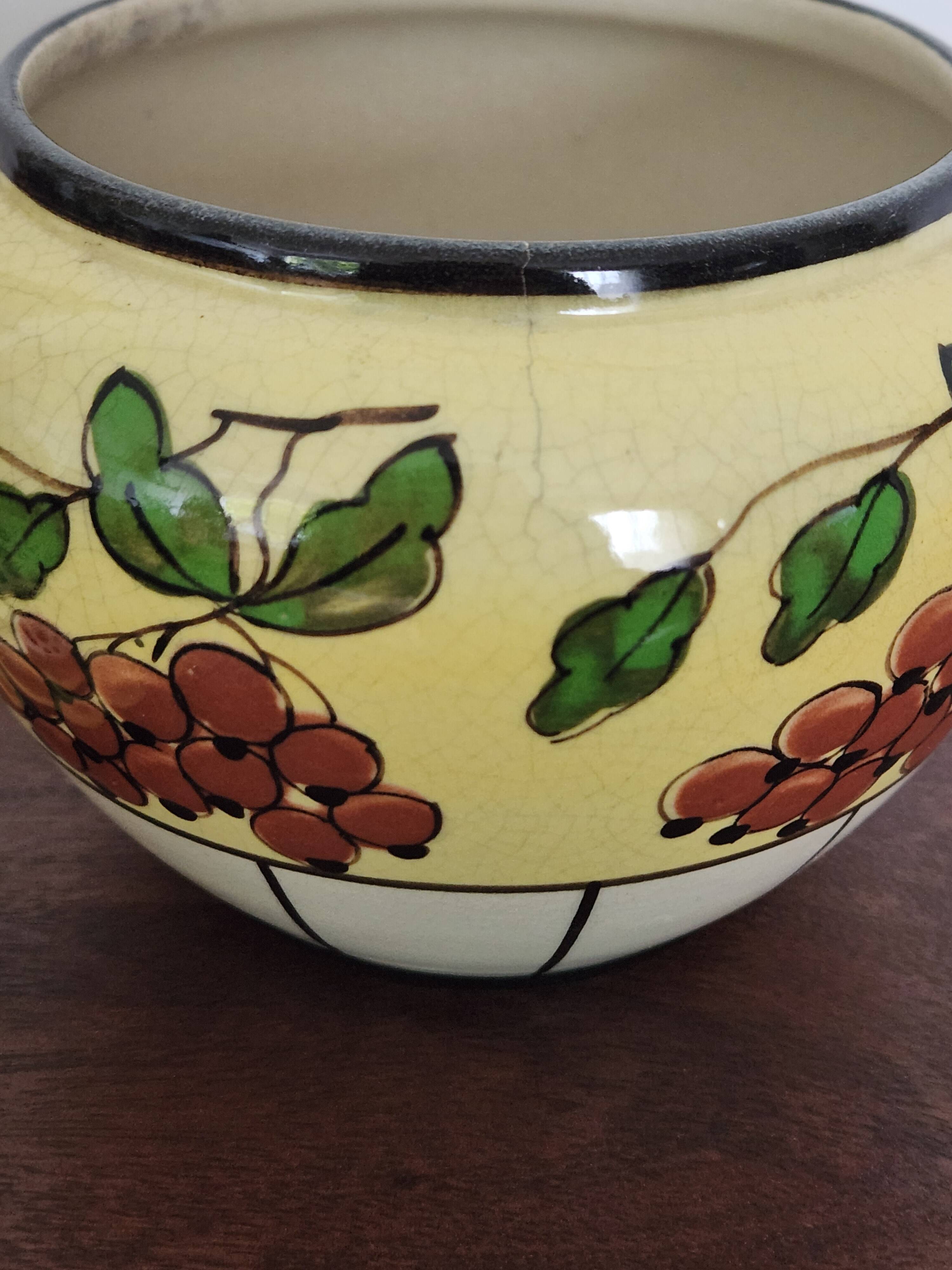 Pique fleur ancien en faïence de Belgique