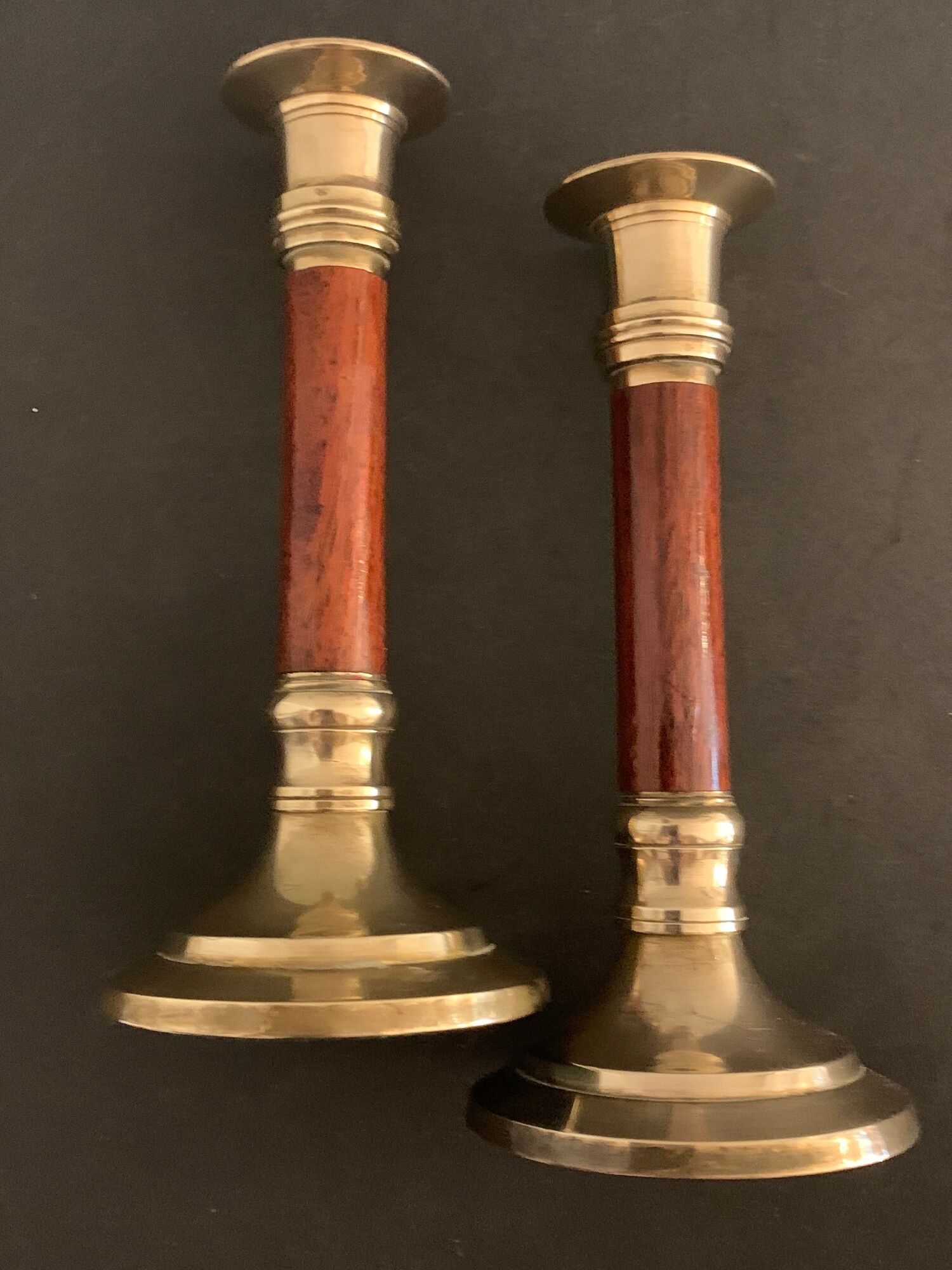 Pair of brass and mahogany wood candle holders