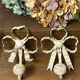 Metal and wood bow and ribbon hooks