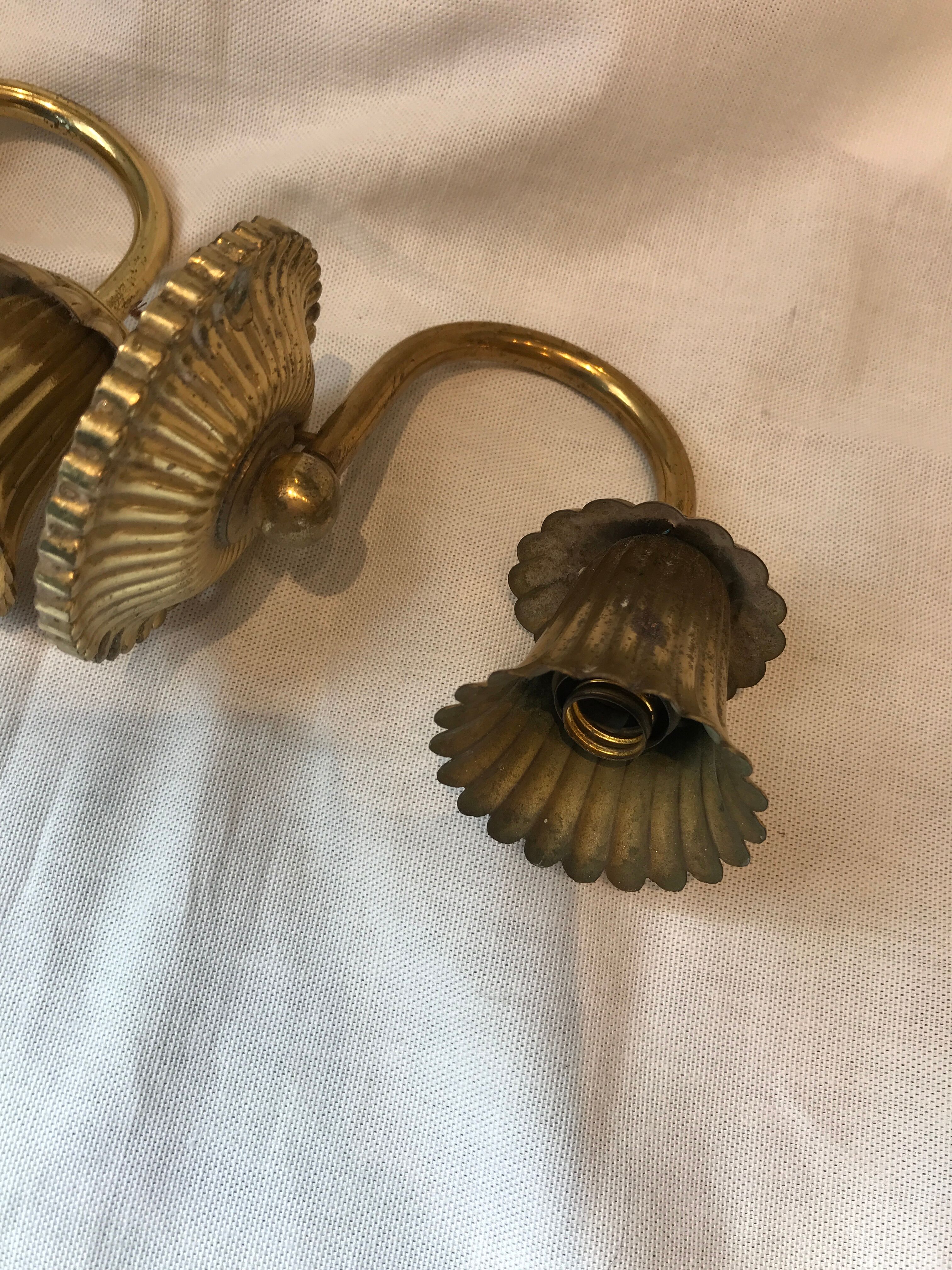 Pair of golden wall light