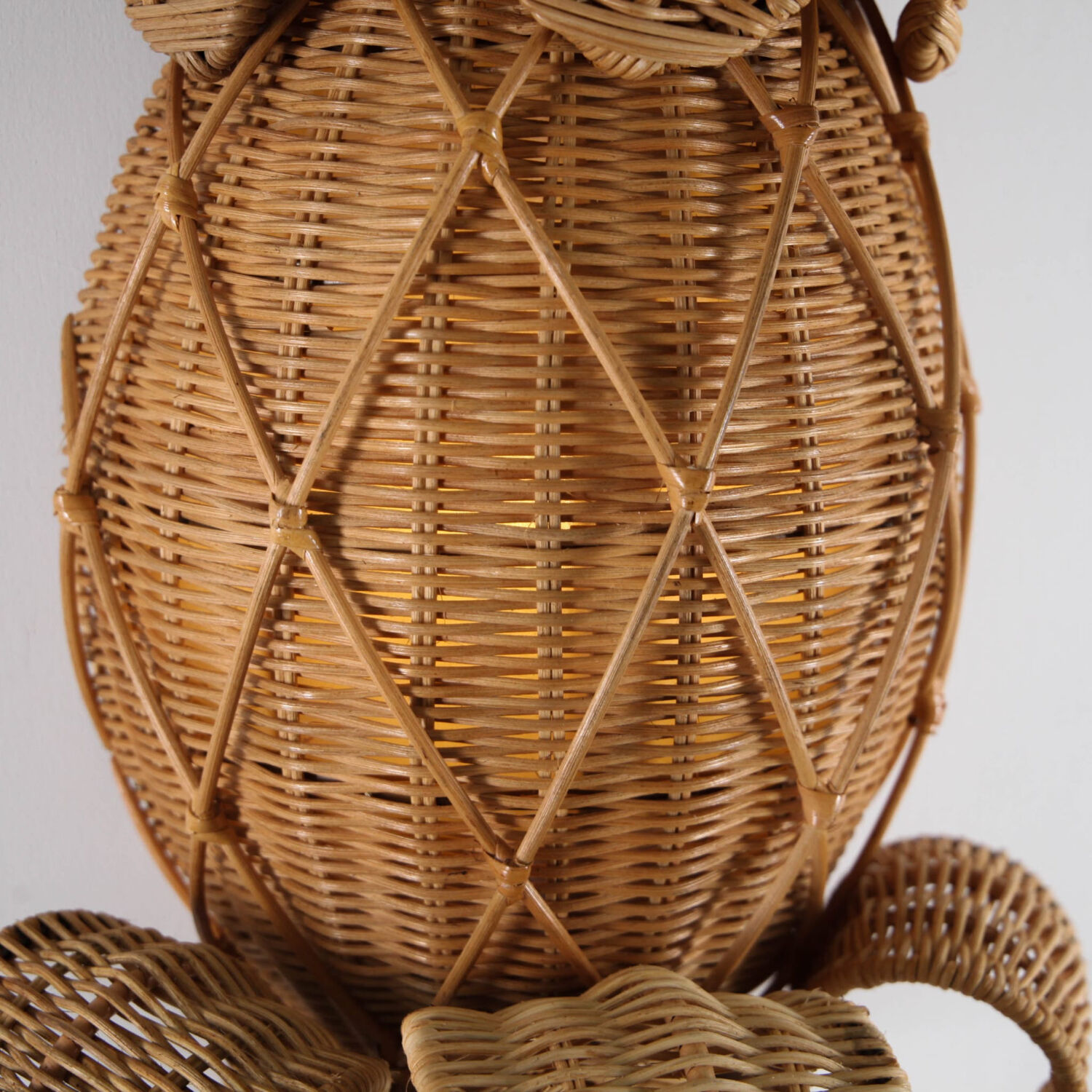 Pair of "pineapple" wall lights in rattan