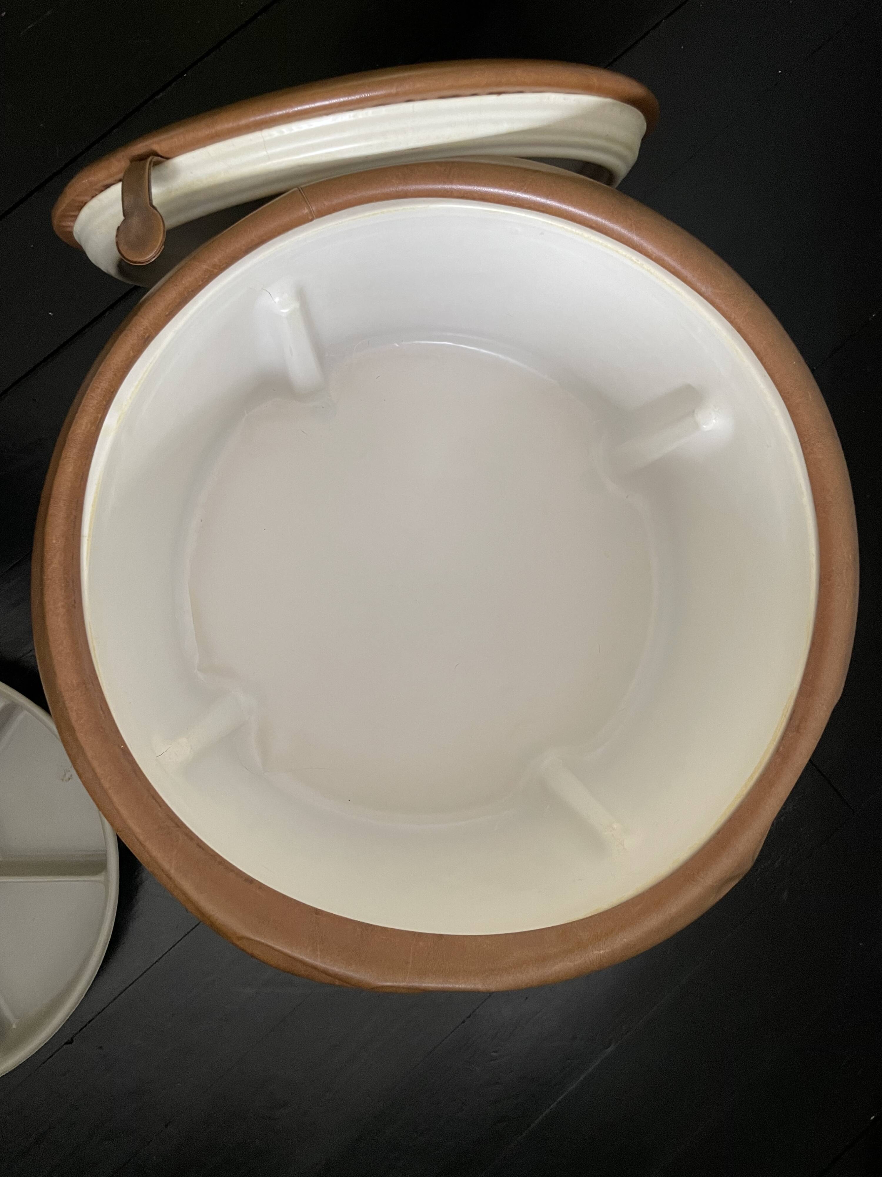 Light brown leather pouf with storage