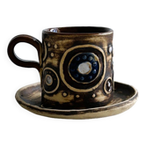 Signed ceramic mug.