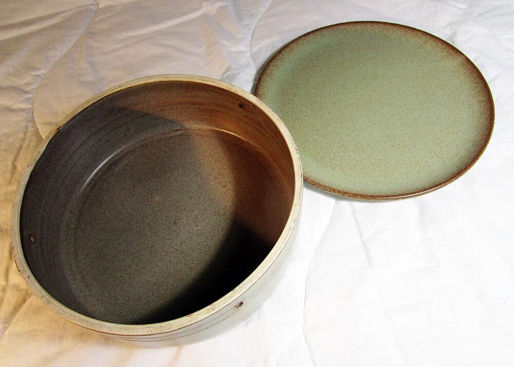 Sandstone cheese platter and bell