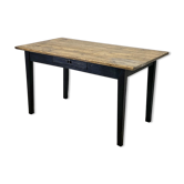 Varnished farmhouse table and blackened wood