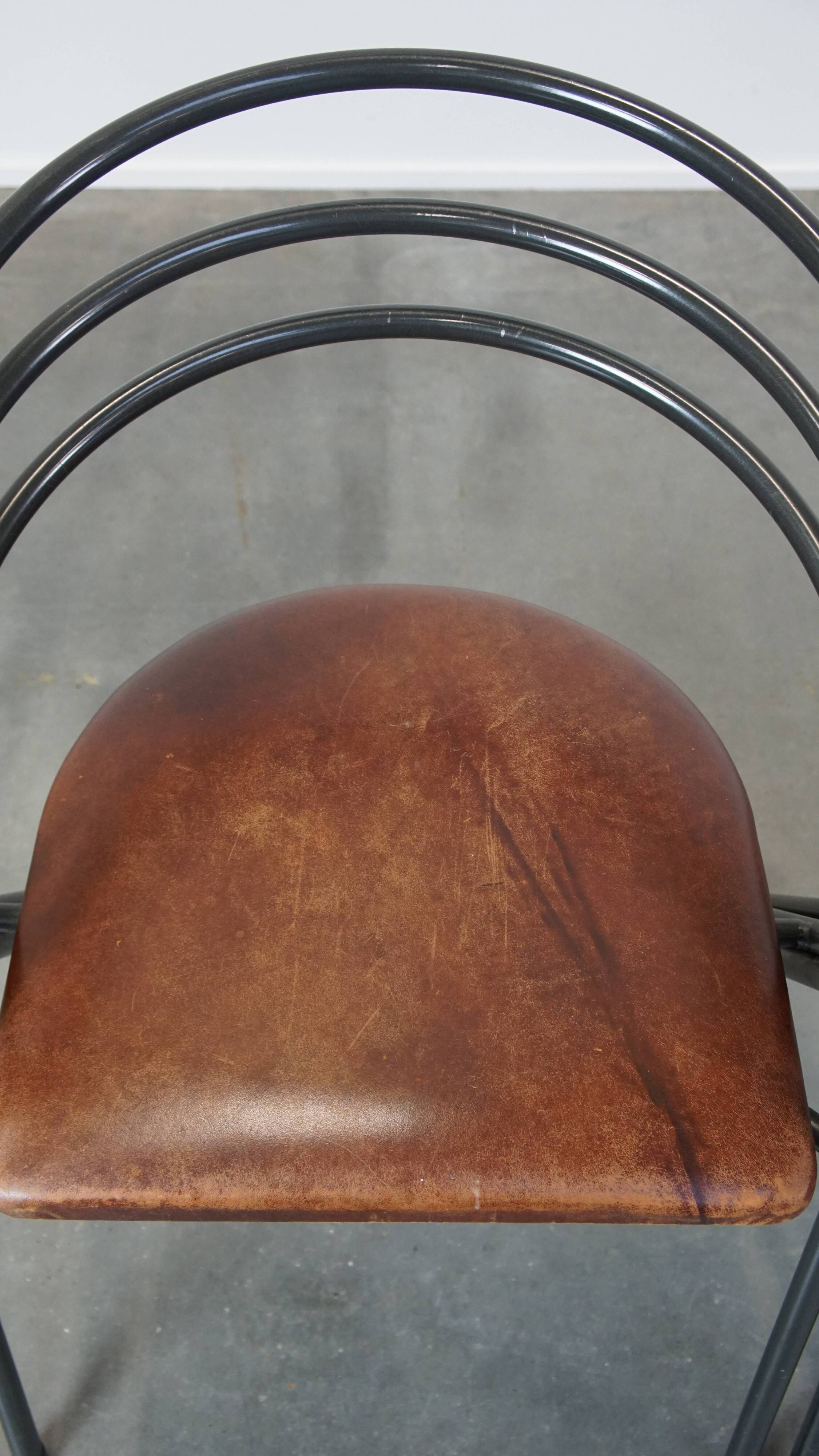 Set of 4 1970s design dining chairs with leather seats and metal frame
