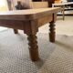 Antique solid wood coffee table – 2 drawers – turned legs