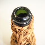 Bouteille en rotin vintage