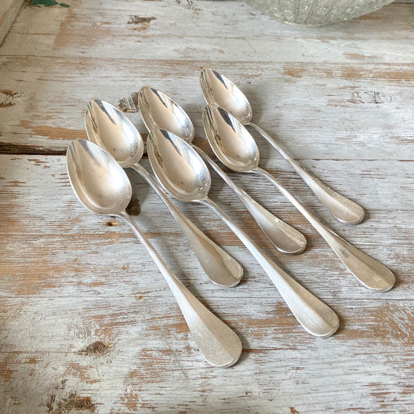 Series of 6 large silver metal spoons
