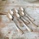 Series of 6 large silver metal spoons