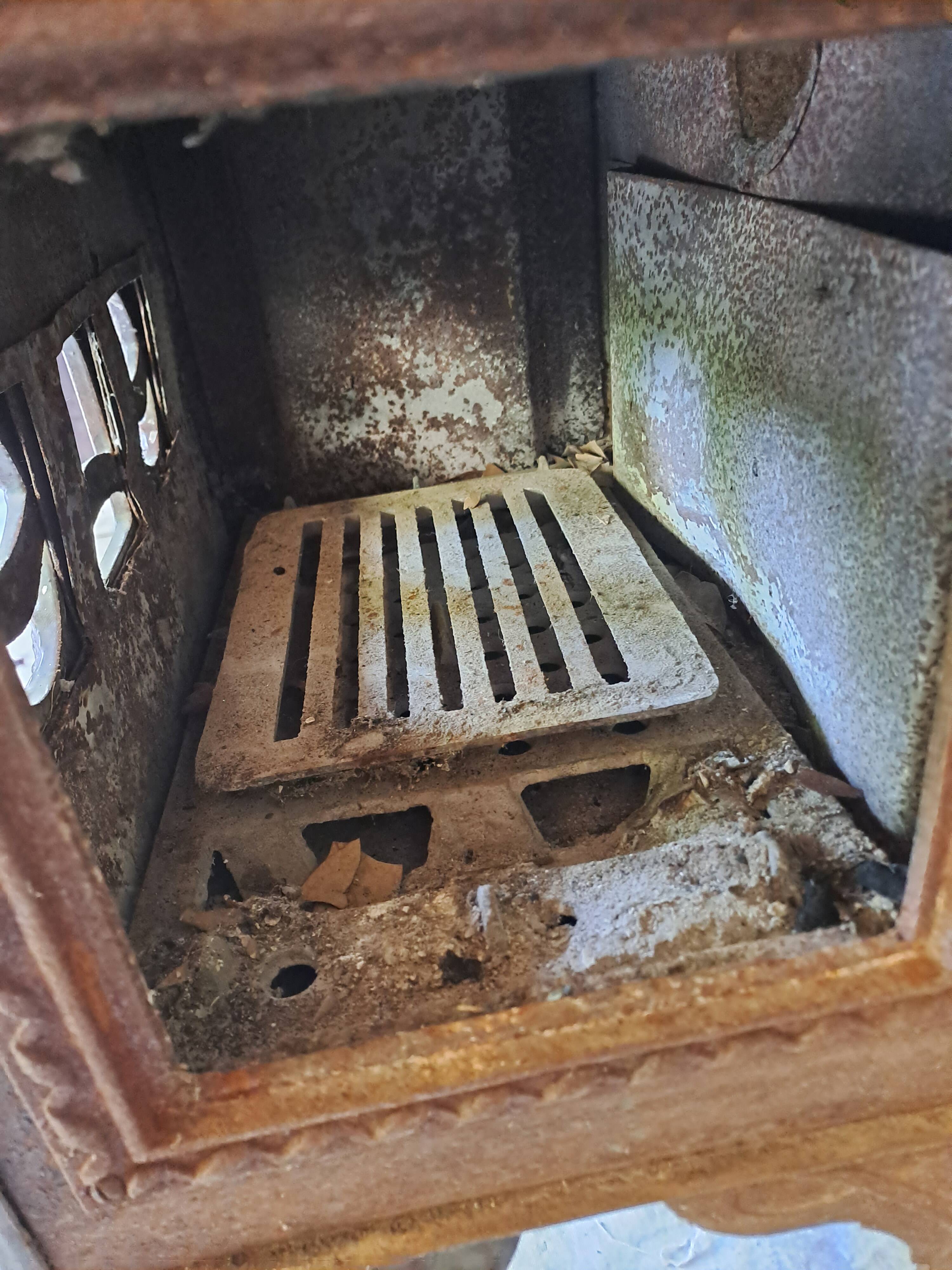 Antique enameled cast iron art deco wood stove, Phebus brand, aubergine color