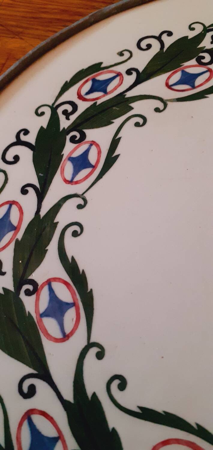 Porcelain and zinc trivet circa 1900