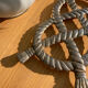 Vintage silver metal rope trivia