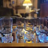 12 smoked glass stemmed glasses from the 70s and 80s.