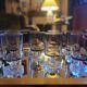 12 smoked glass stemmed glasses from the 70s and 80s.