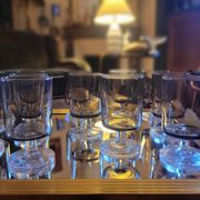 12 smoked glass stemmed glasses from the 70s and 80s.