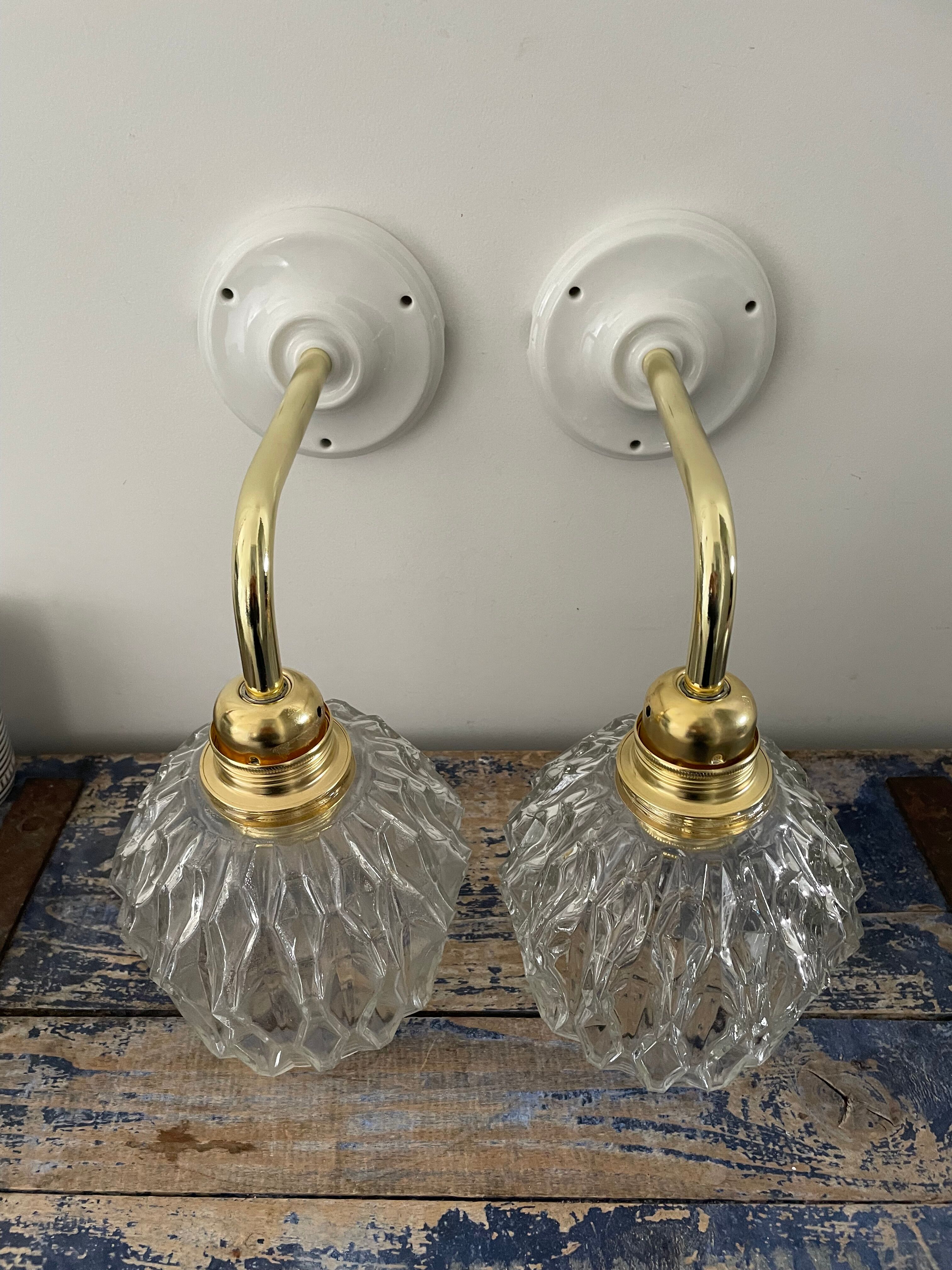 Set of two vintage sconces in chiseled glass
