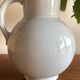 Antique vase in pale blue ceramic