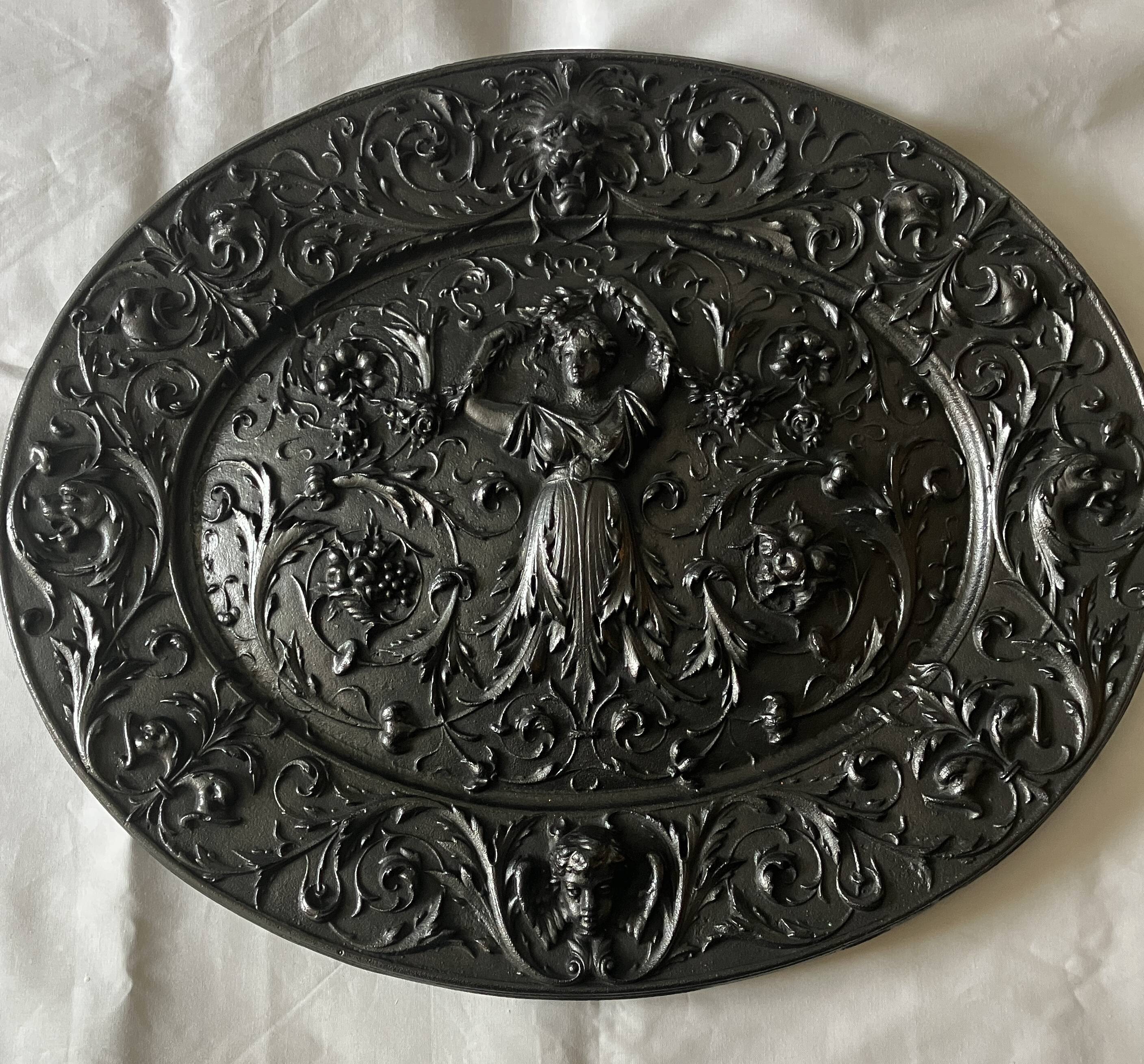 Plaque décorative en fonte début 20°siècle.