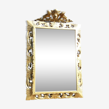 Renaissance style mirror in gilded wood