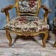 Pair of Louis XV style Baroque armchairs in gilded and carved wood circa 1900