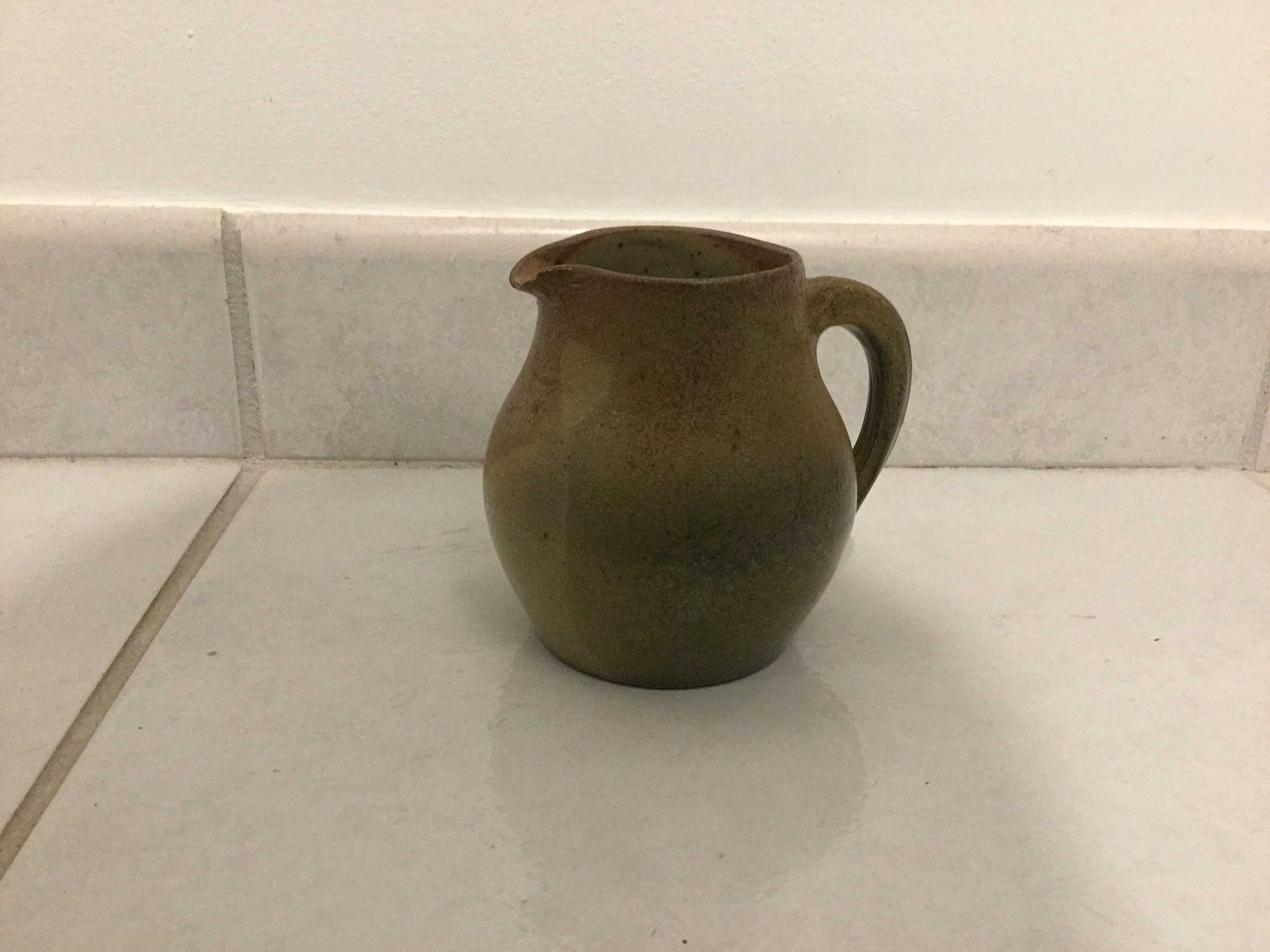 Sandstone milk pot