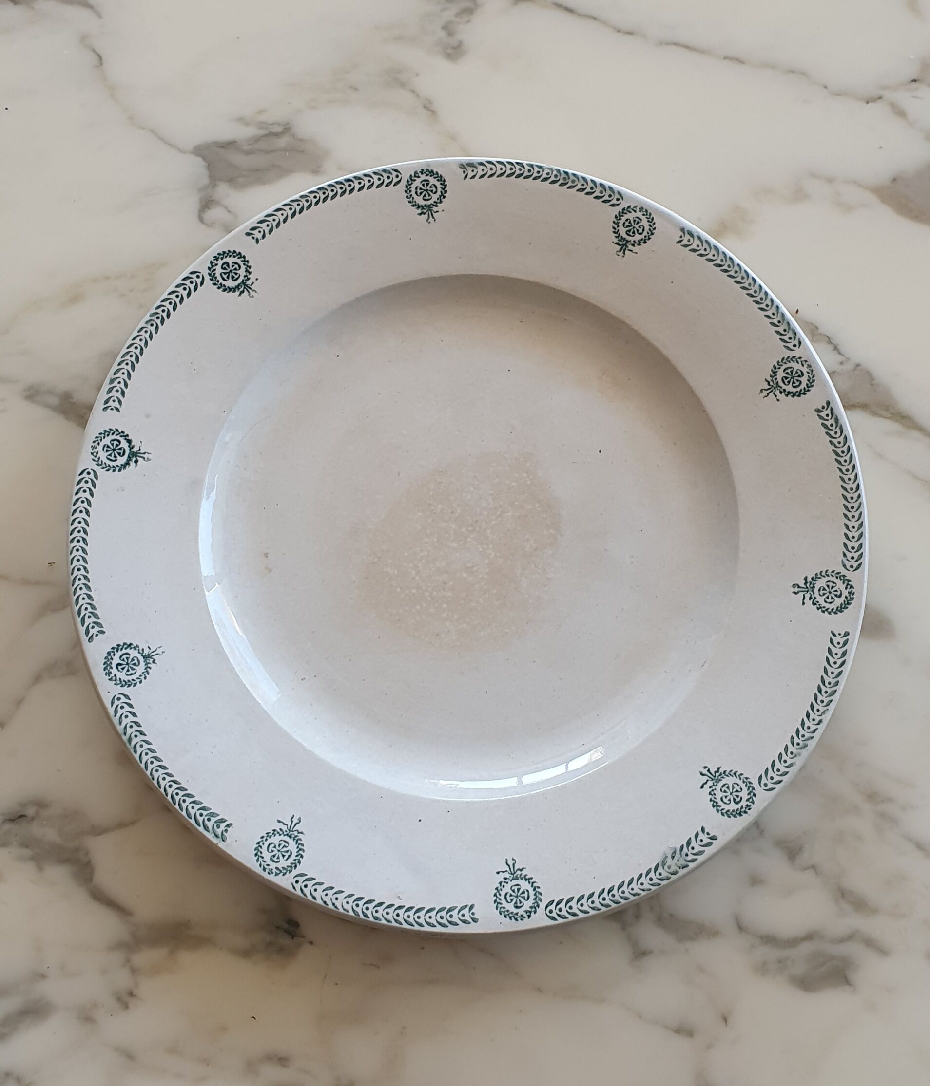 Old round dish