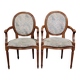 Pair of Louis XVI style armchairs with medallion backs, 20th century