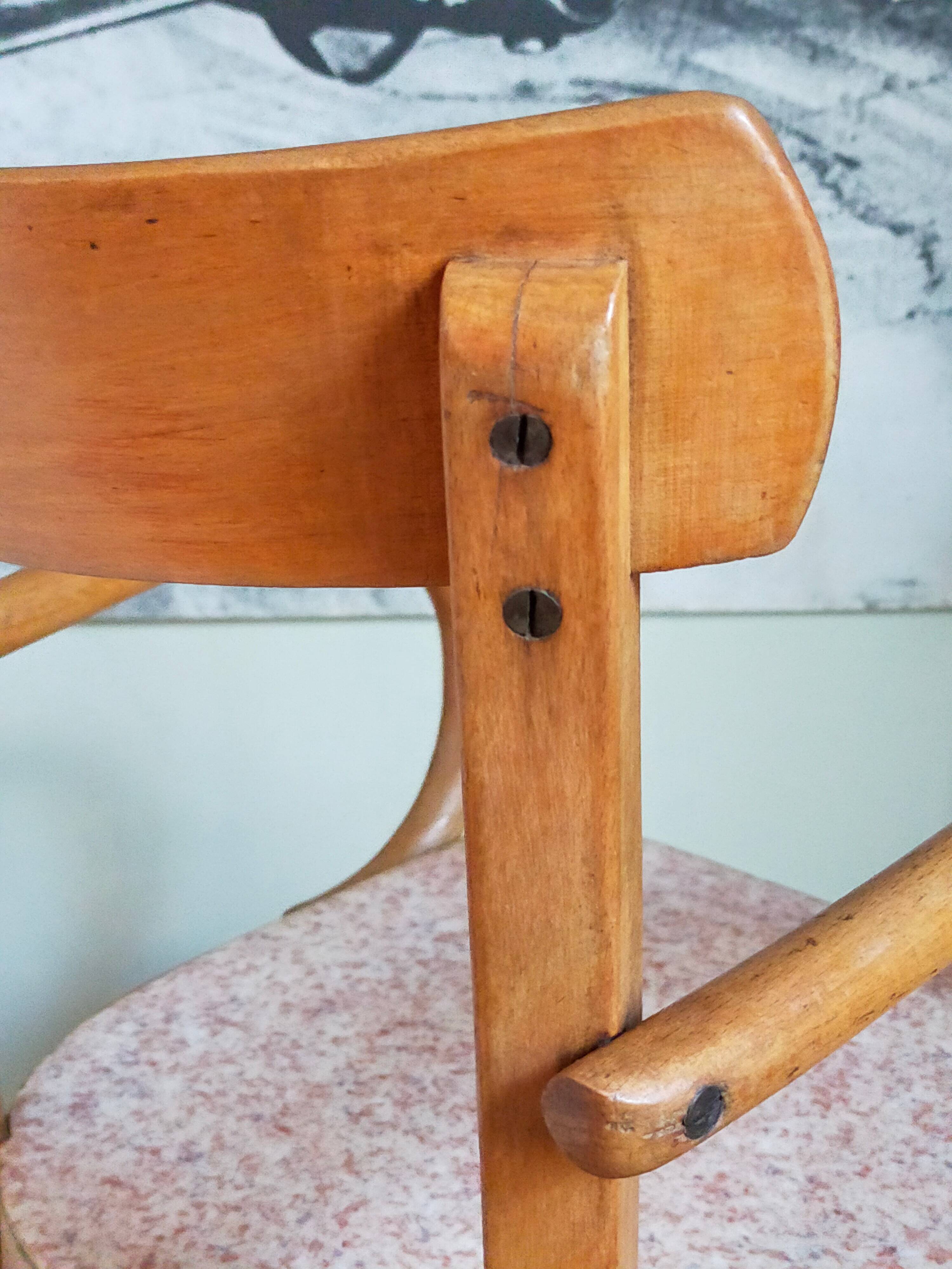 Children's armchair in old bent wood