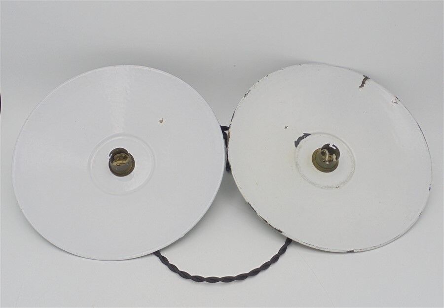 Trio of green enamelled sheet metal hanging lamps