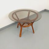 Vintage round smoked glass and rattan coffee table from the 70s