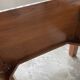 Modernist armchair in exotic wood and leather