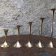 Series of 5 brass candlesticks