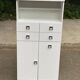 White bathroom storage cabinet from the 80s