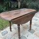 Antique table with flaps