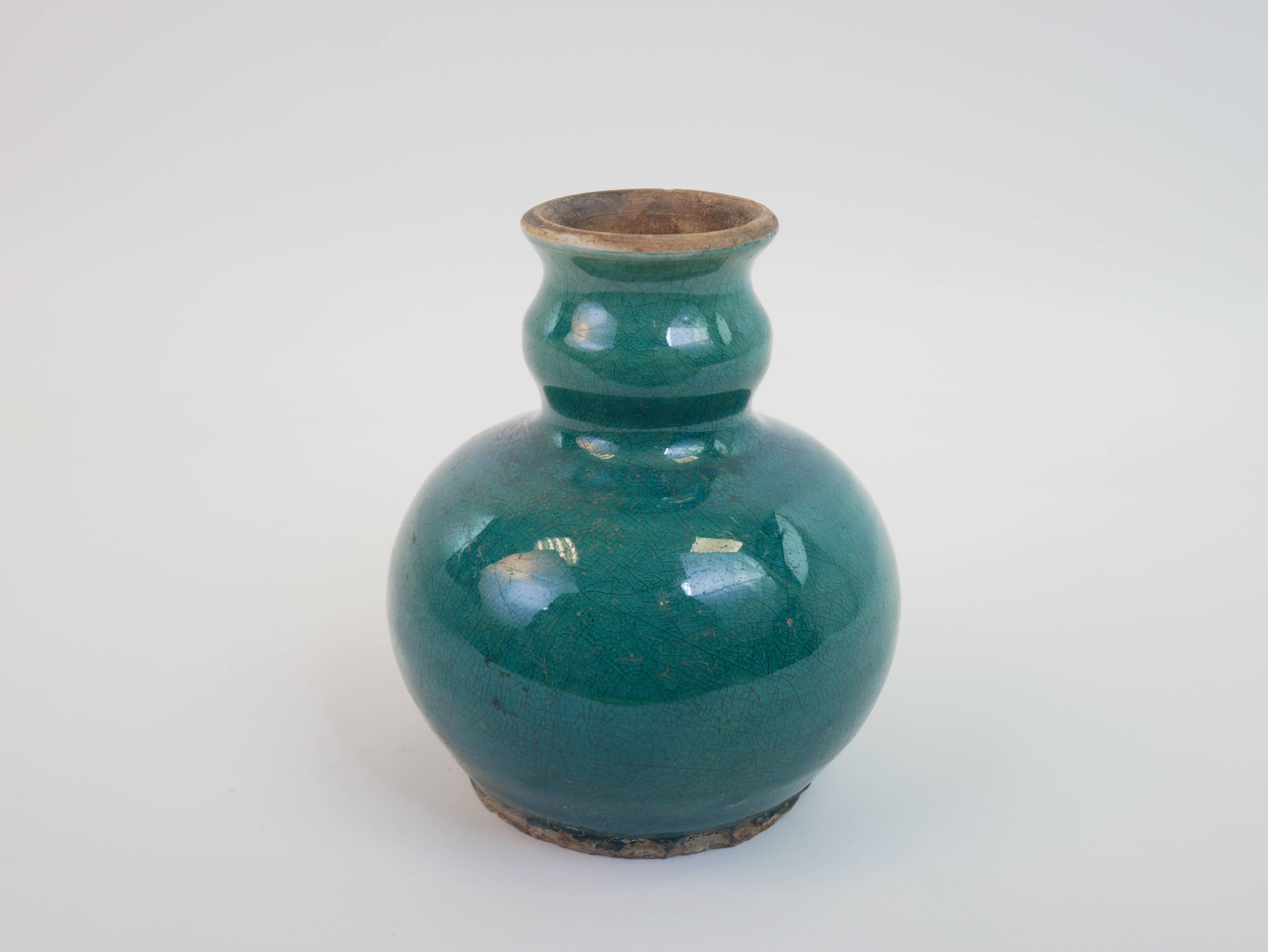 Small old blue ceramic vase