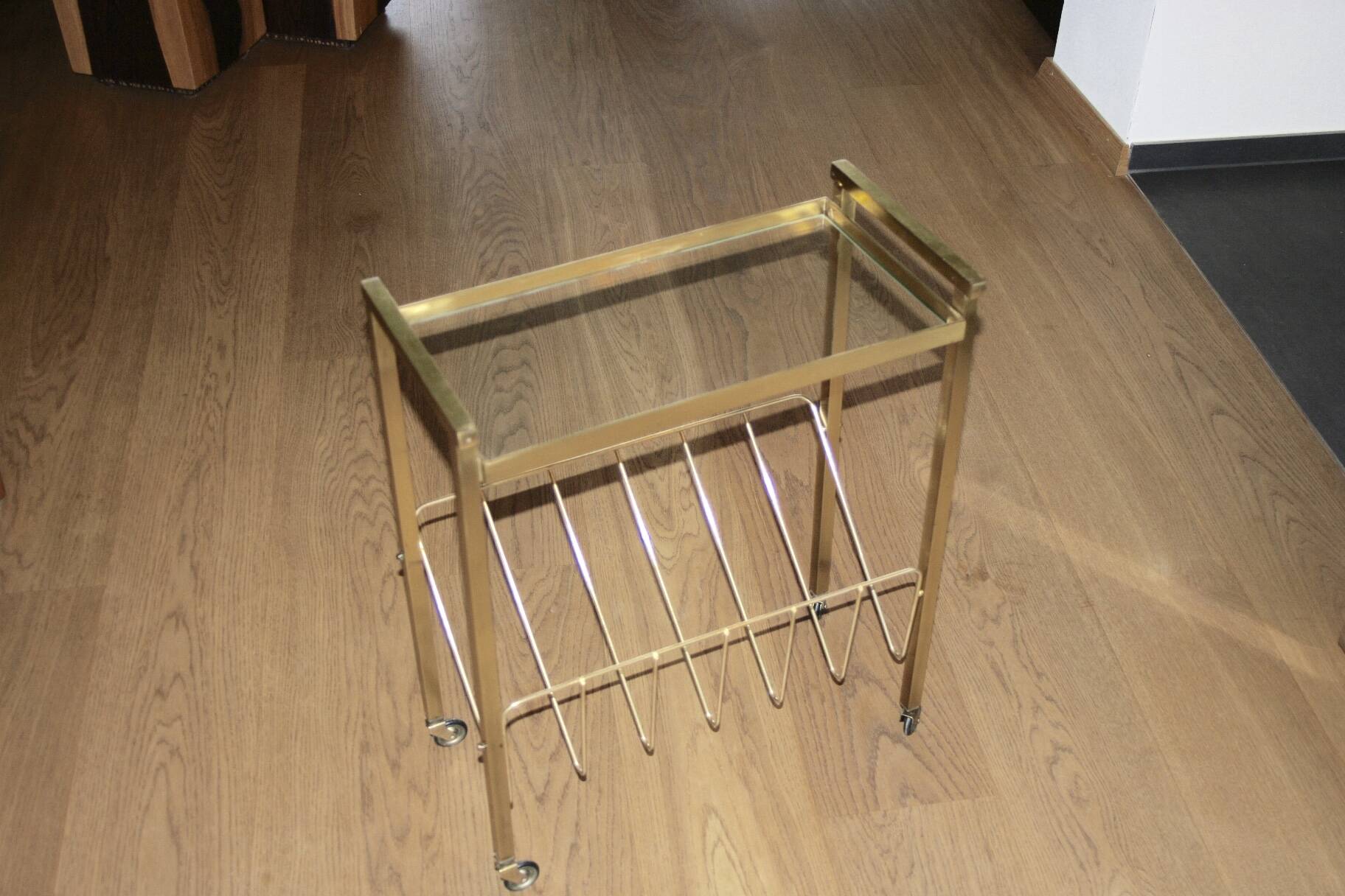 Vintage side table with brass and glass magazine rack