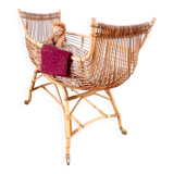 Vintage rattan pirogue cradle