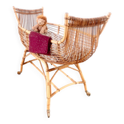Vintage rattan canoe cradle
